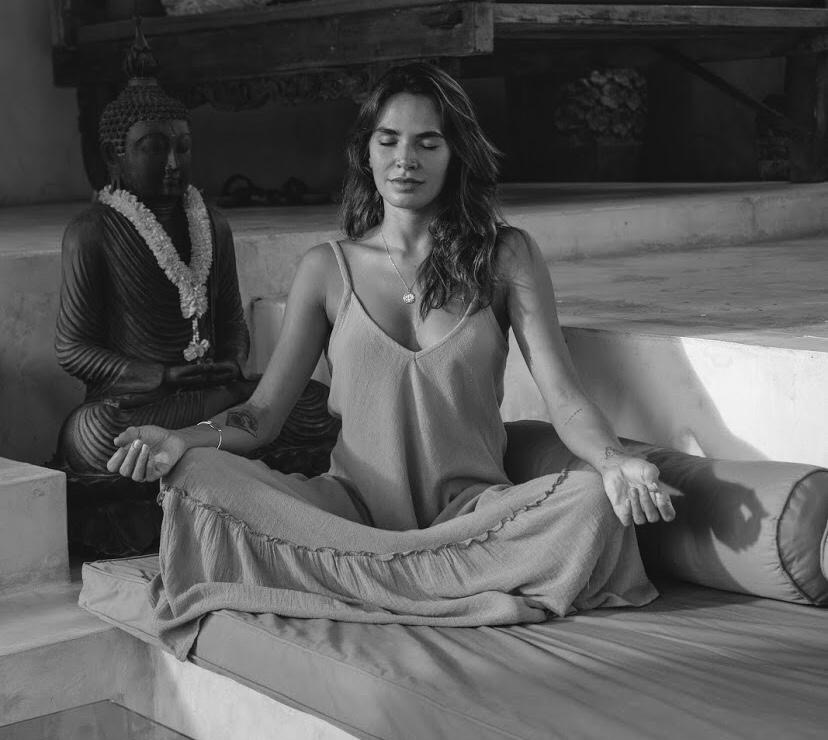 Dr. Bianca Ciabattari seated in meditation